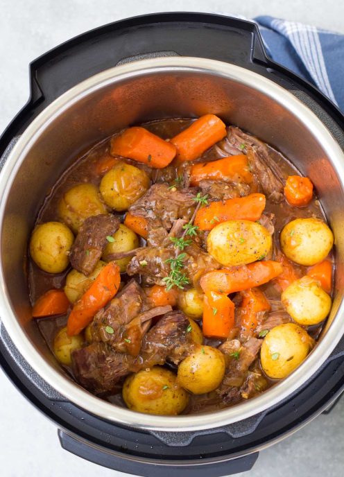 Pot roast with carrots and potatoes in an instant pot.